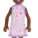 Boneca Barbie Chelsea 14 cm Vestido Floral Lilás Sapato Rosa com Coque